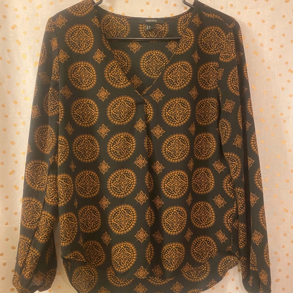 Black long sleeve shirt with pretty brown prints.
